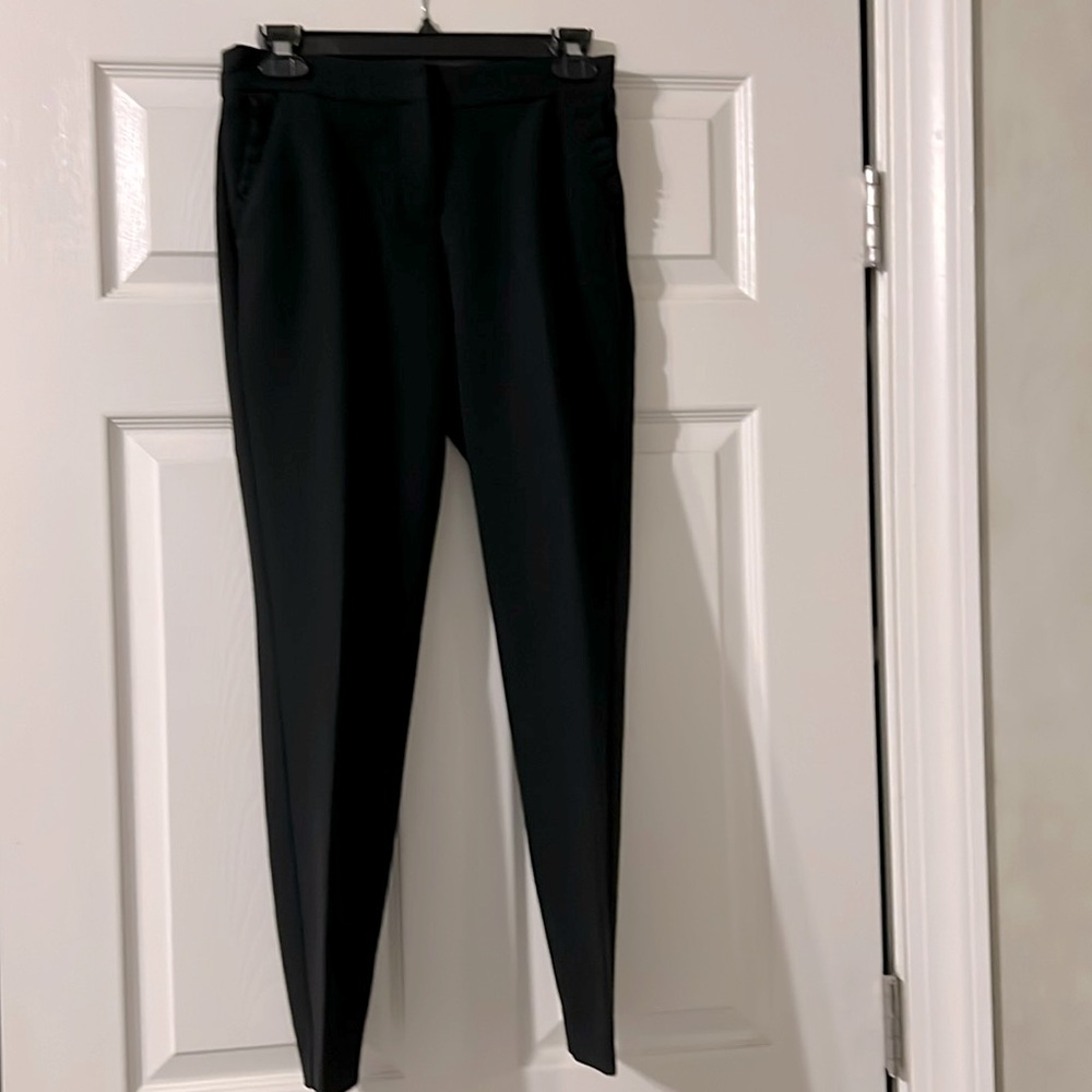 Express Workwear: Columnist Ankle Mid Rise Pants w/ Ruffle Pockets